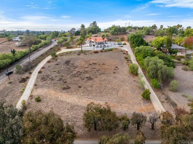 a front view of a house with yard