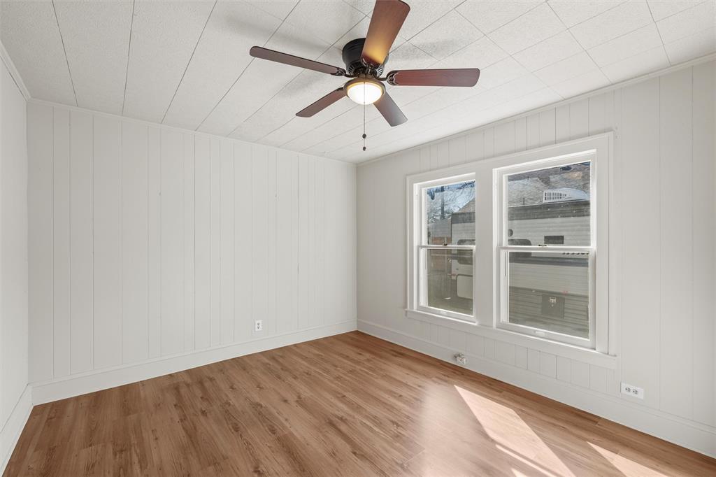 2912 Edmond Avenue Waco, TX 76707 - Photo 16 of 30 Spare room featuring light wood-style floors and ceiling fan