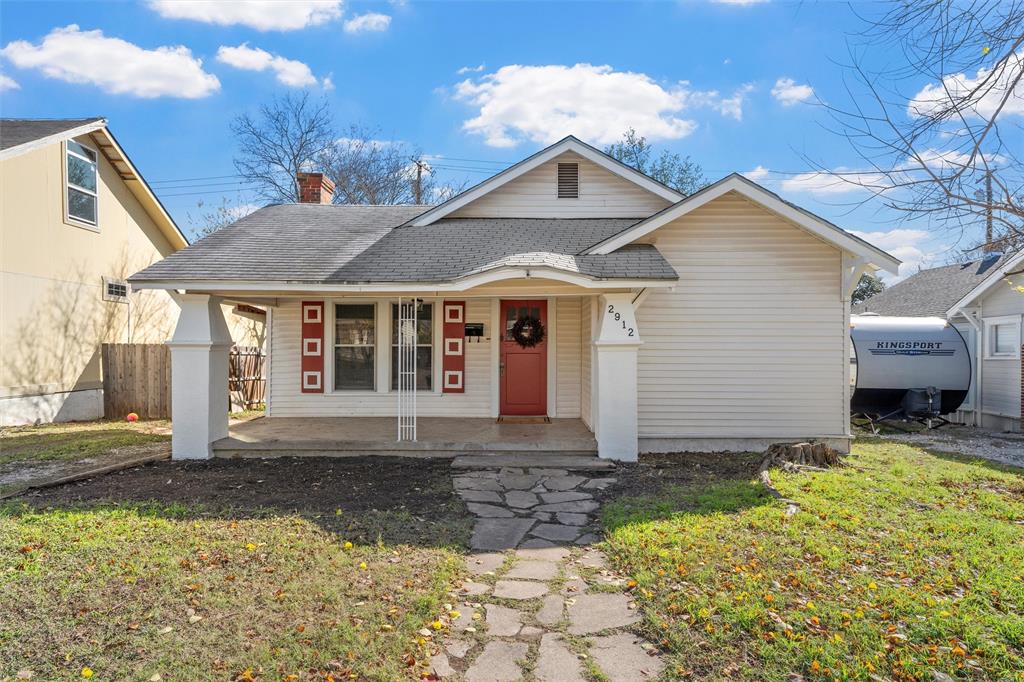 2912 Edmond Avenue Waco, TX 76707 - Photo 2 of 30 View of front of house with a porch, a shingled roof, a chimney, and oil tank