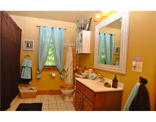 162 Franklin Road Scituate, RI 02825 - Photo 14 of 20 Bathroom. Upper bathroom easily accommodates the needs of the two bedrooms that occupy the upper space.