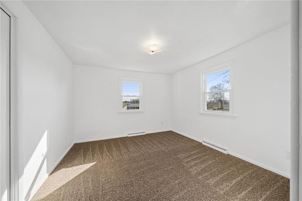 773 Homestead Avenue Scottdale, PA 15683 - Photo 19 of 28 an empty room with a workspace