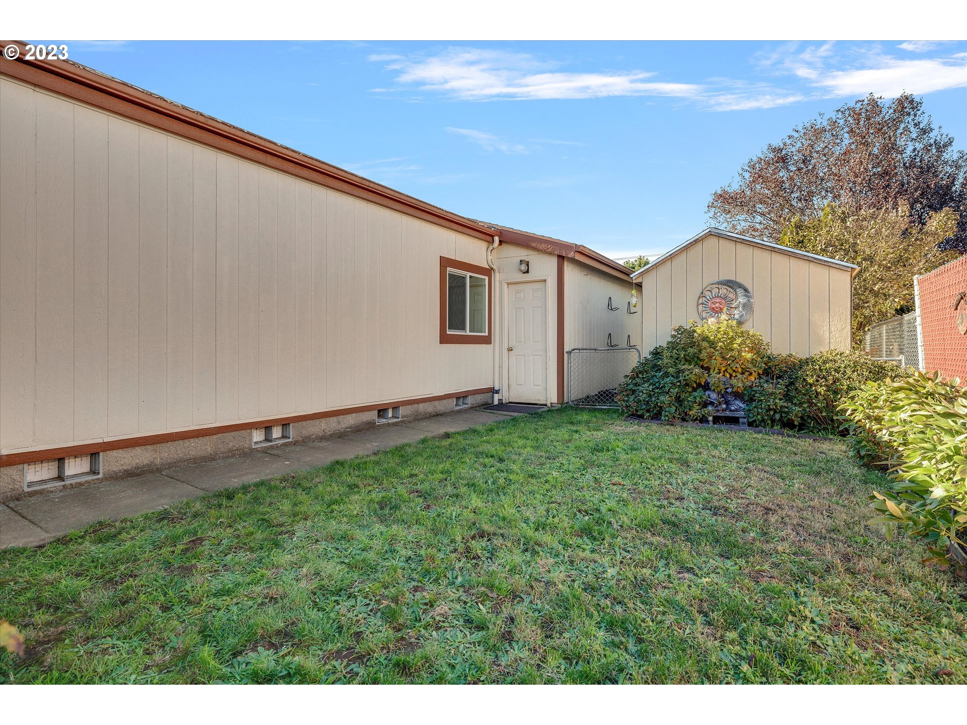 20804 Butteville Road Northeast Donald, OR 97020 - Photo 18 of 18 a front view of a house with garden