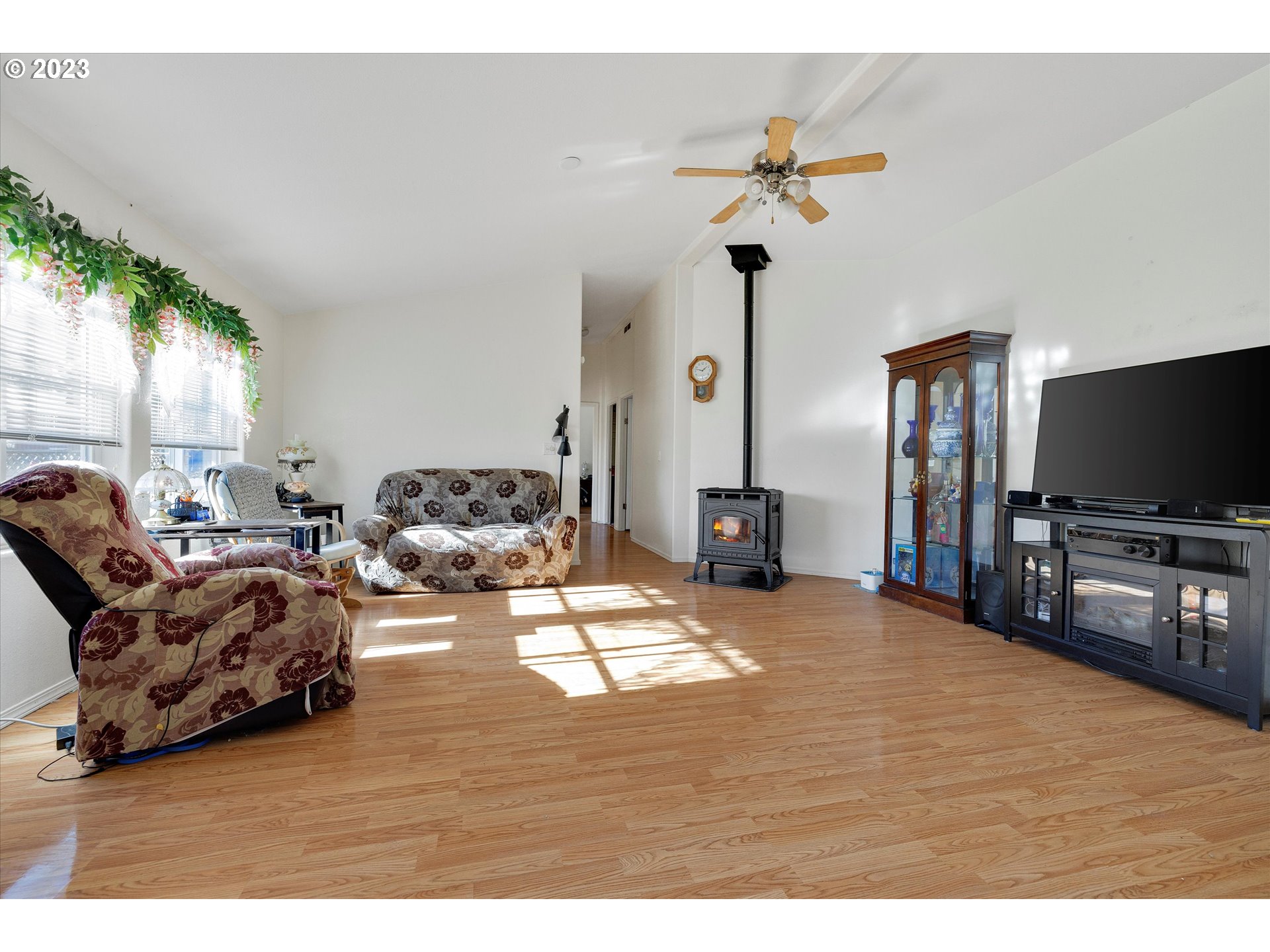20804 Butteville Road Northeast Donald, OR 97020 - Photo 3 of 18 a living room with furniture and a flat screen tv