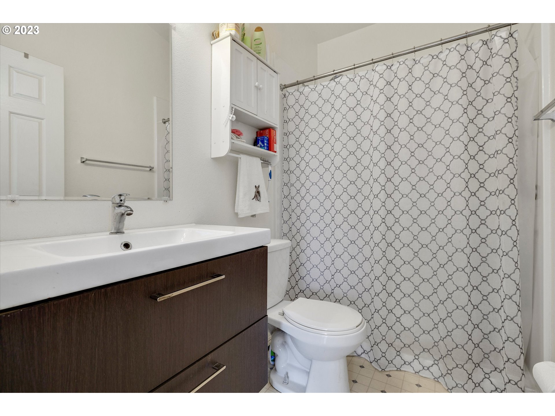 20804 Butteville Road Northeast Donald, OR 97020 - Photo 10 of 18 a bathroom with a sink a toilet and a mirror