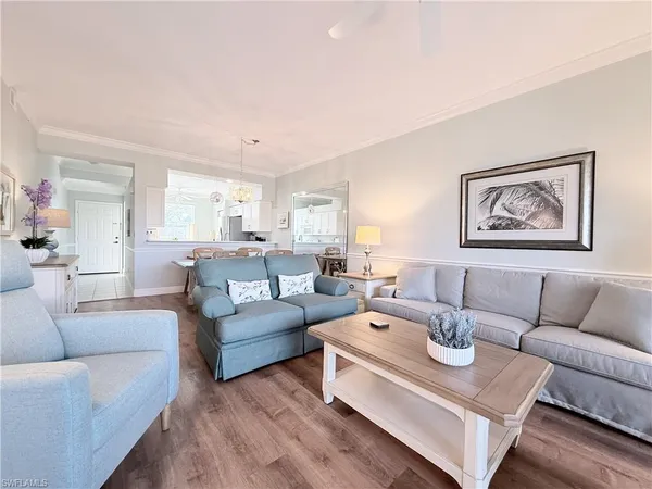 a living room with furniture and a couch