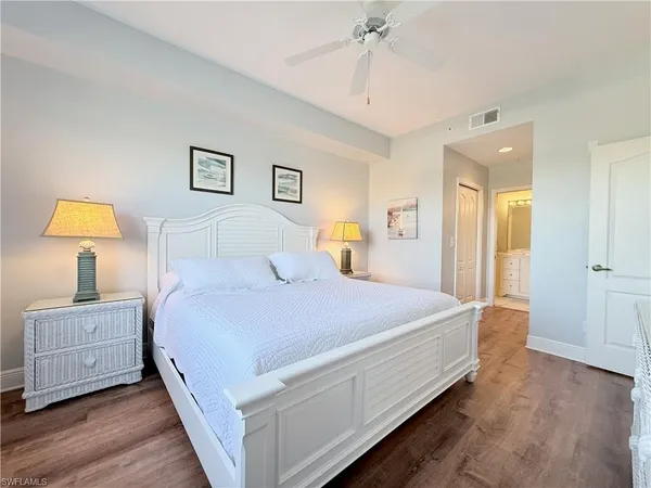 a bedroom with bed and window