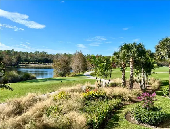 a view of a lake with a yard