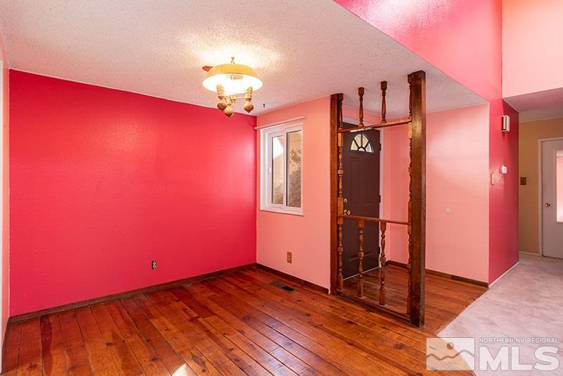 1401 Peavine Road Reno, NV 89503 - Photo 3 of 17 a view of a livingroom with wooden floor