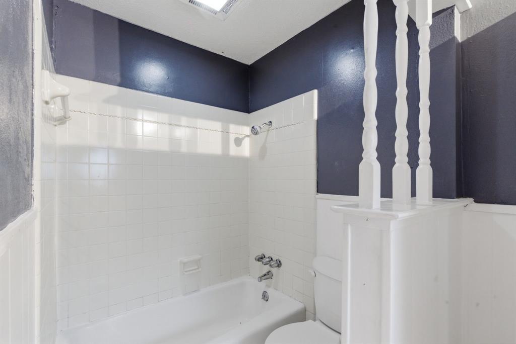 120 Timberlake Drive Azle, TX 76020 - Photo 28 of 32 a bathroom with a bathtub and shower