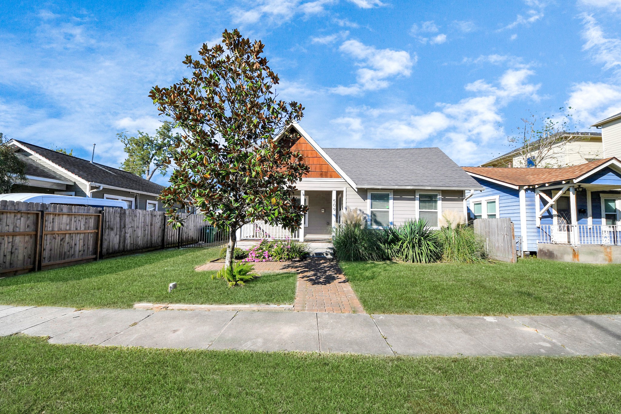 509 Vincent Street Houston, TX 77009 - Photo 2 of 39 a view of a yard in front of house