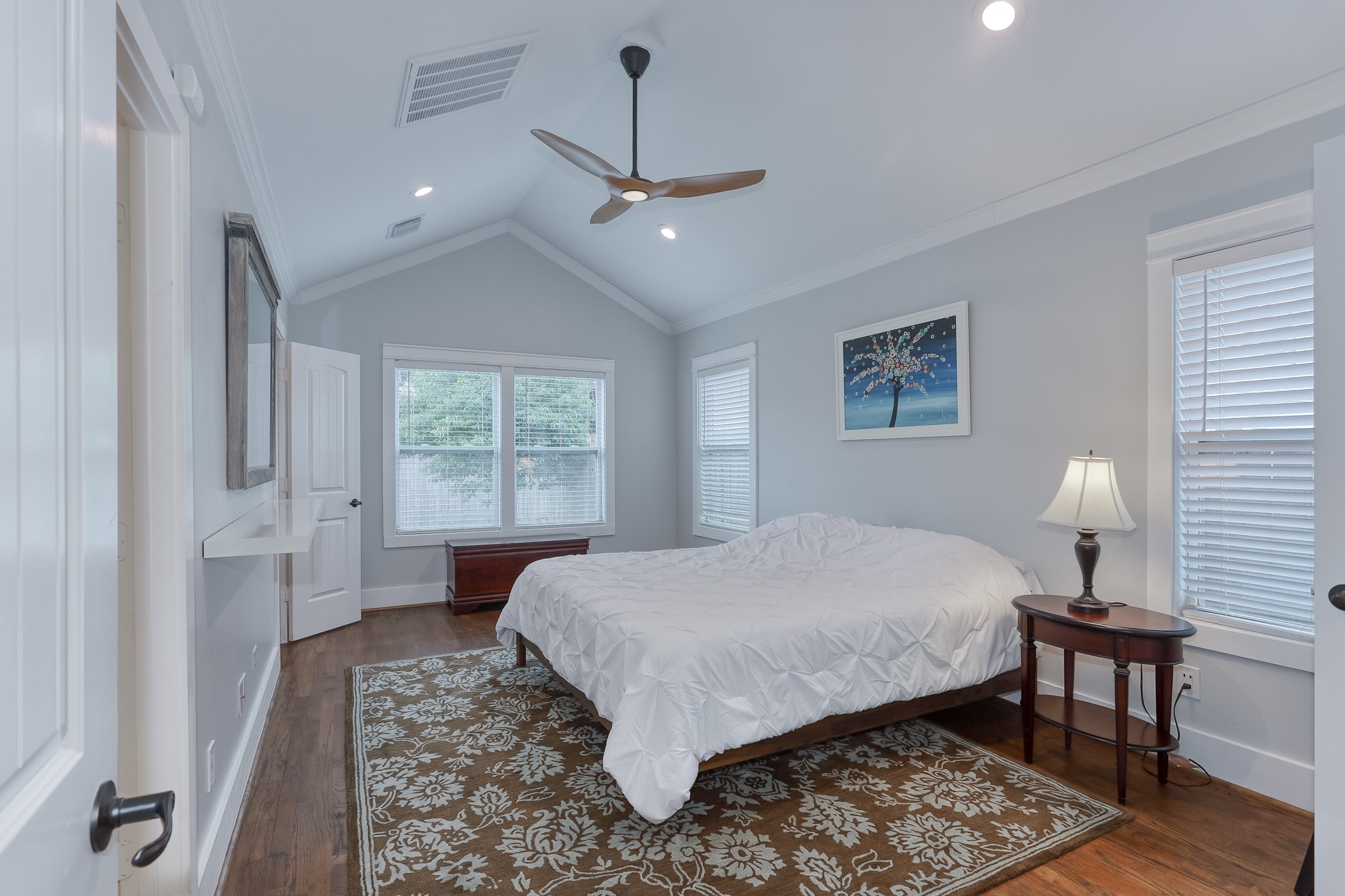 509 Vincent Street Houston, TX 77009 - Photo 21 of 39 a bedroom with a bed window and a table