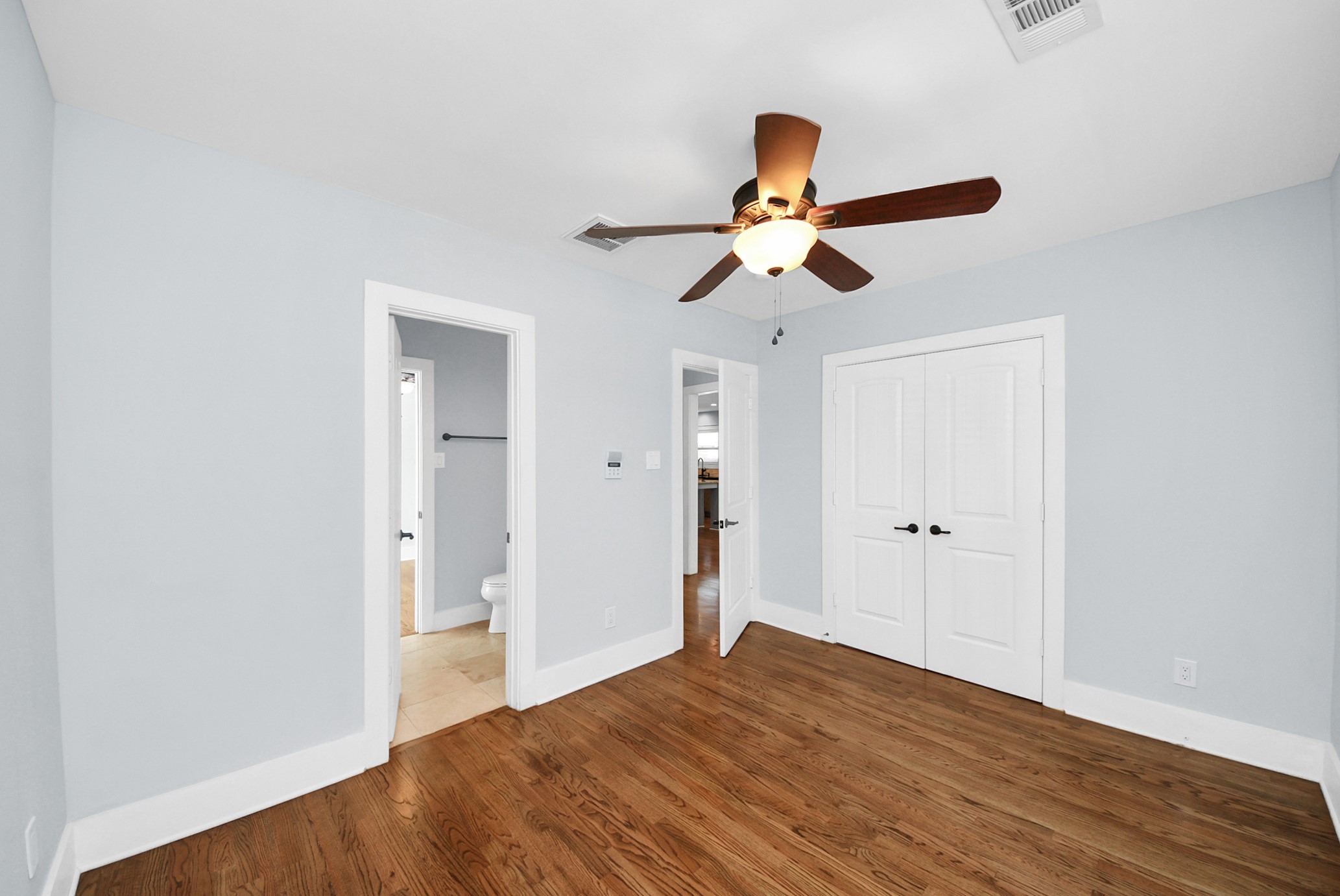 509 Vincent Street Houston, TX 77009 - Photo 28 of 39 a view of empty room with wooden floor