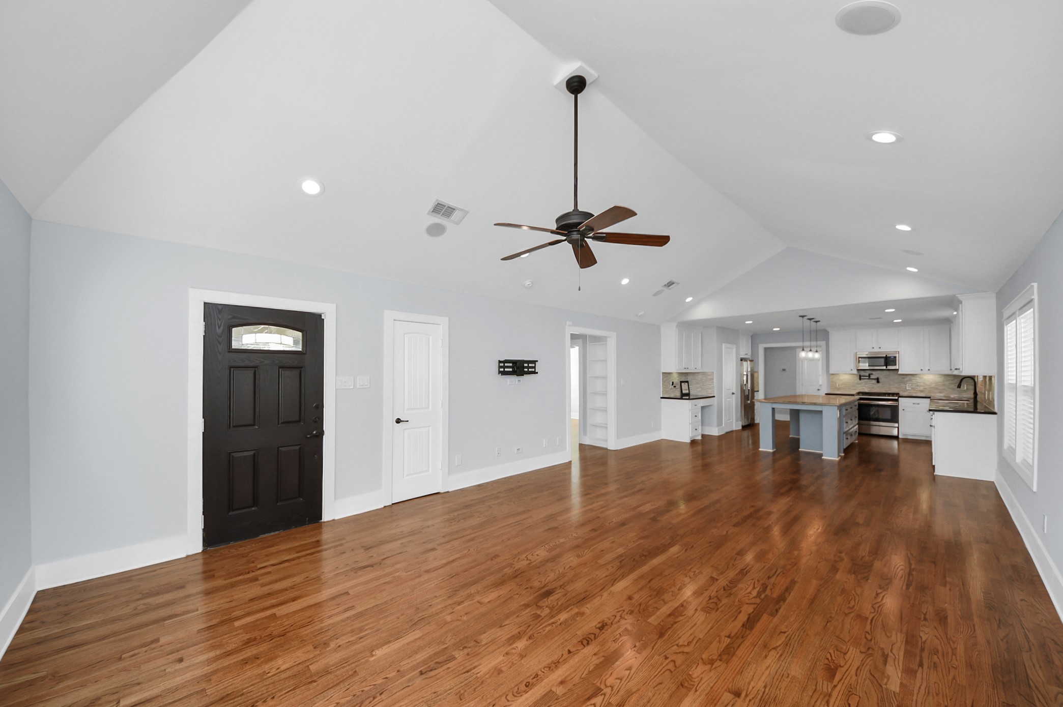 509 Vincent Street Houston, TX 77009 - Photo 8 of 39 a view of empty room with wooden floor