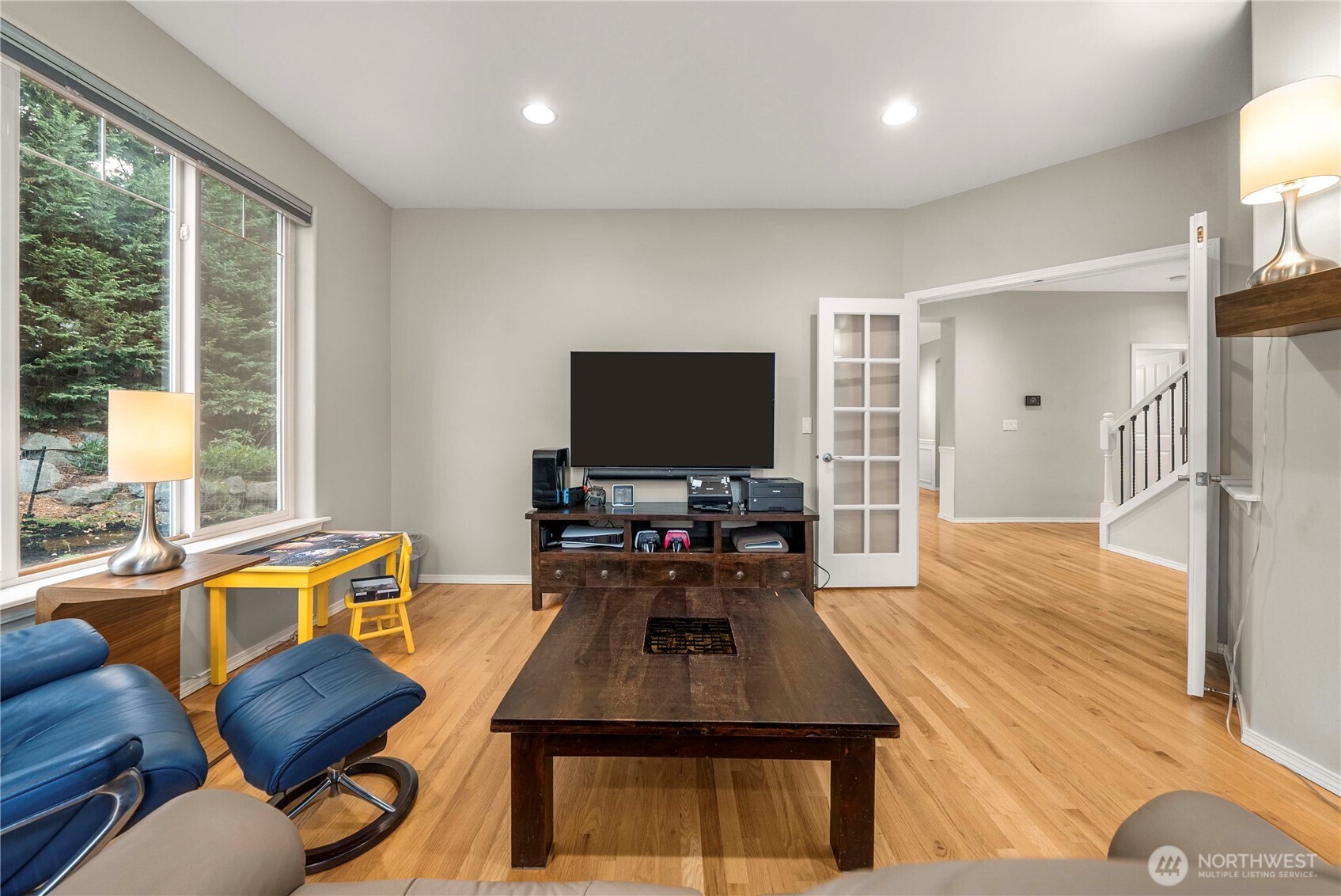 3723 Lincoln Court Northeast Renton, WA 98056 - Photo 11 of 37 a living room with furniture and a flat screen tv