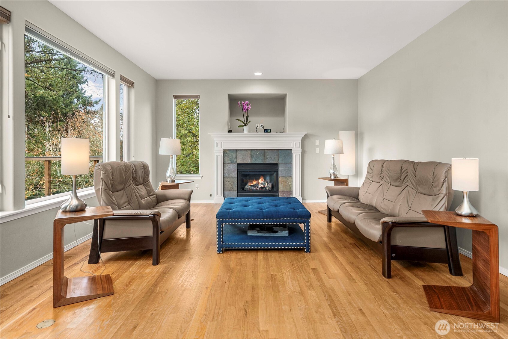 3723 Lincoln Court Northeast Renton, WA 98056 - Photo 12 of 37 a living room with furniture and a fireplace