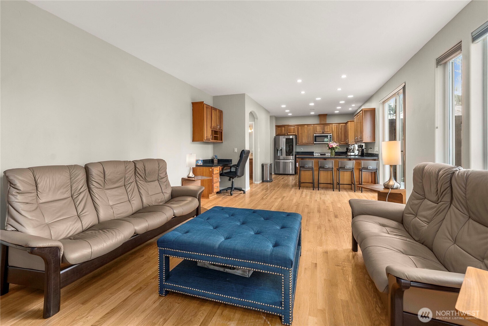 3723 Lincoln Court Northeast Renton, WA 98056 - Photo 14 of 37 a living room with furniture and a dining table with kitchen view