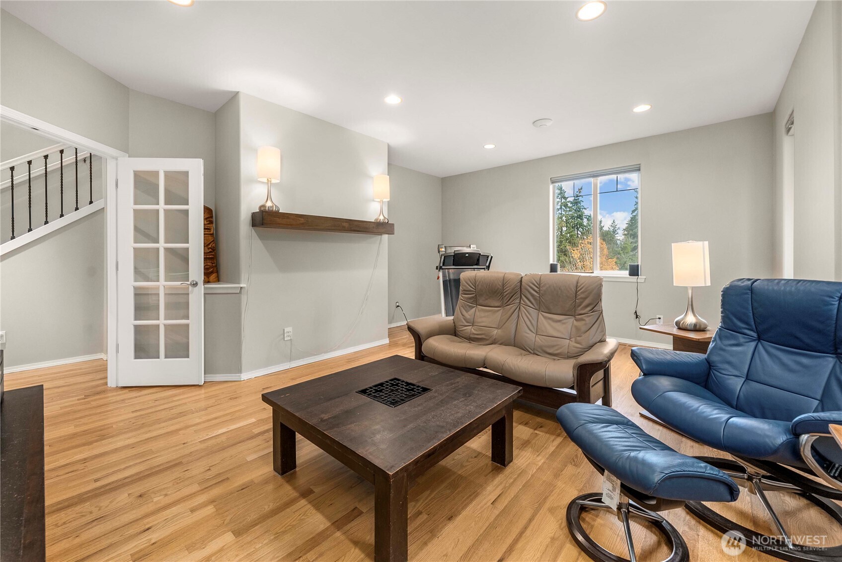 3723 Lincoln Court Northeast Renton, WA 98056 - Photo 16 of 37 a living room with furniture a rug and a window