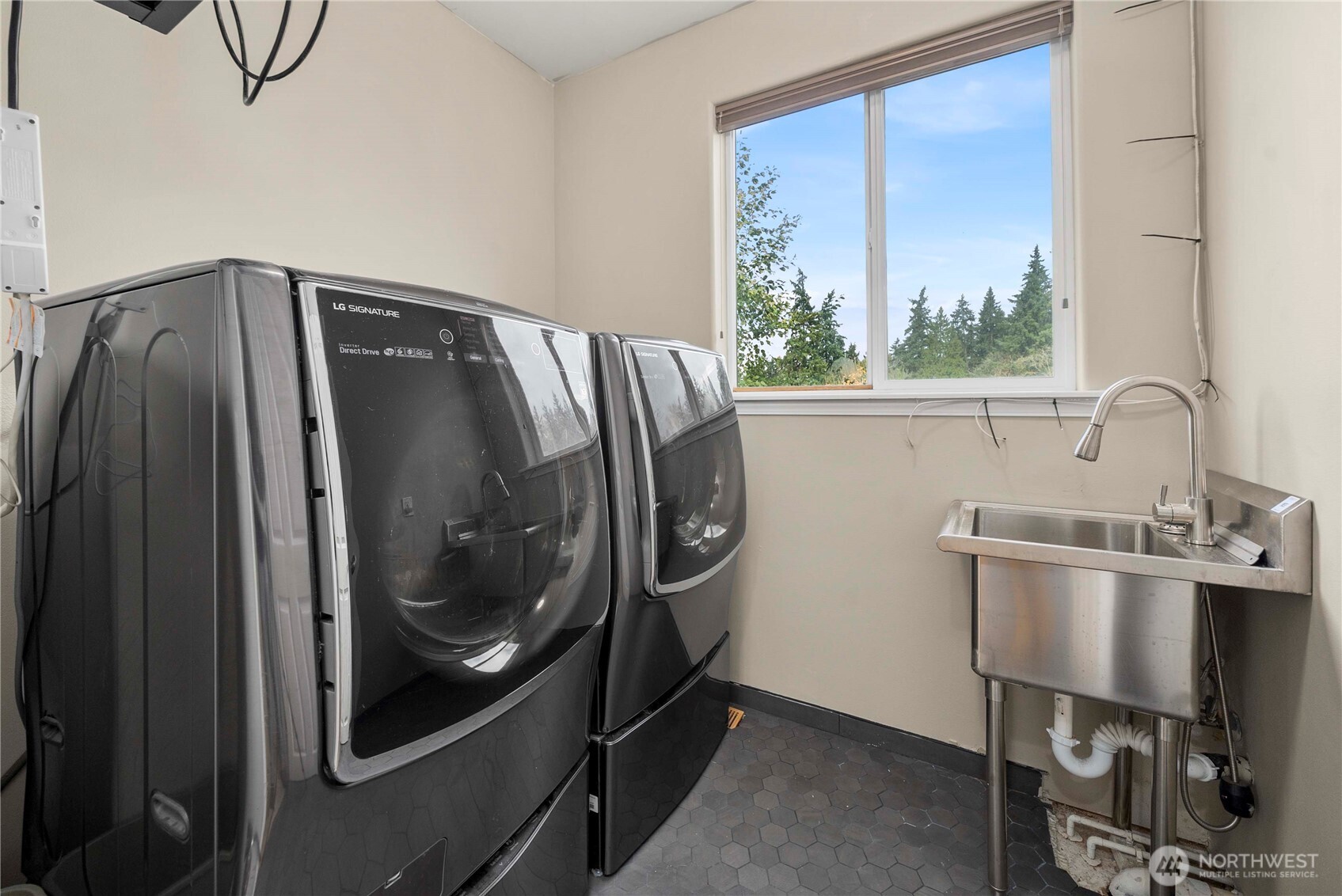 3723 Lincoln Court Northeast Renton, WA 98056 - Photo 17 of 37 a bathroom with a sink and a mirror