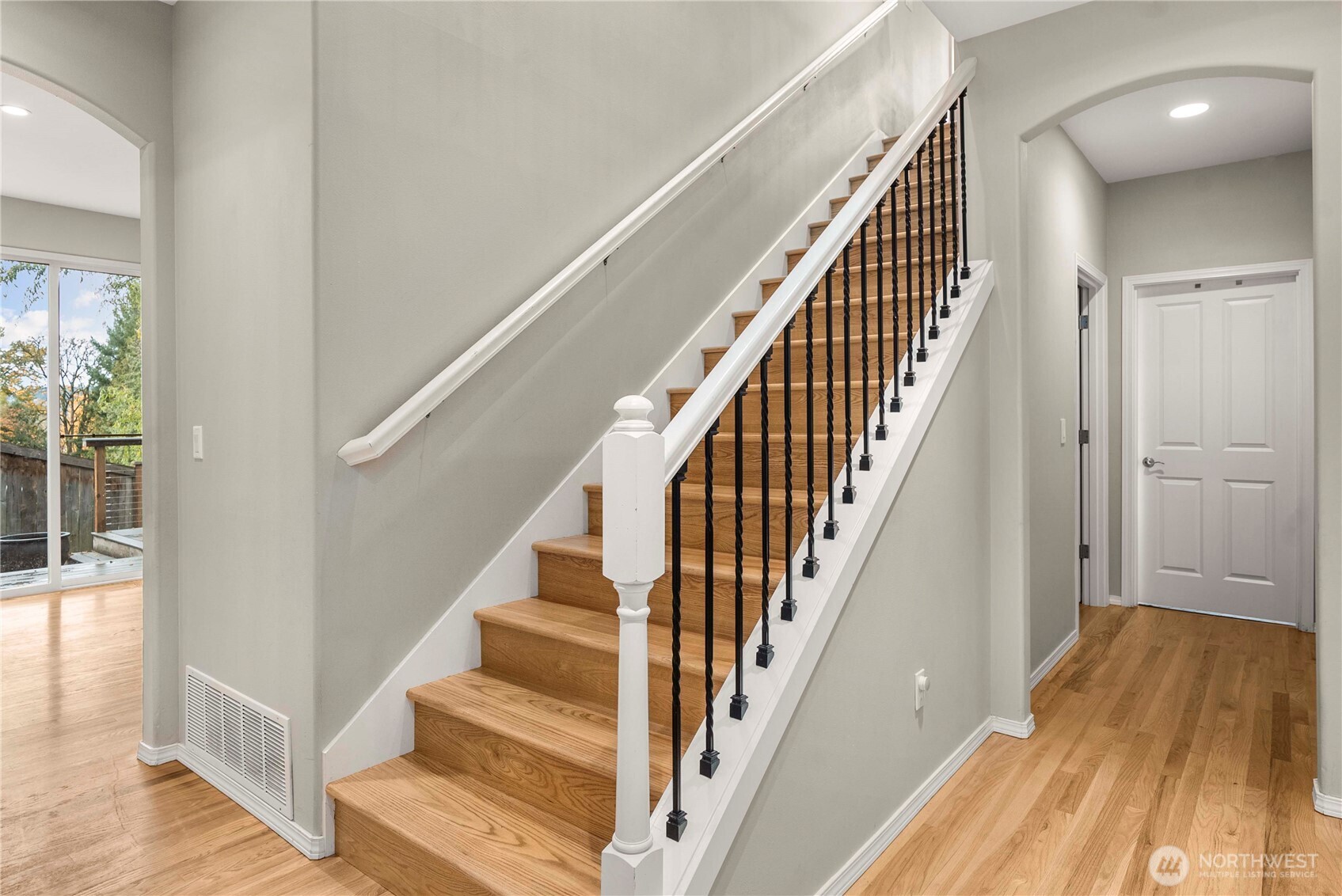 3723 Lincoln Court Northeast Renton, WA 98056 - Photo 18 of 37 a view of staircase with wooden floor and staircase