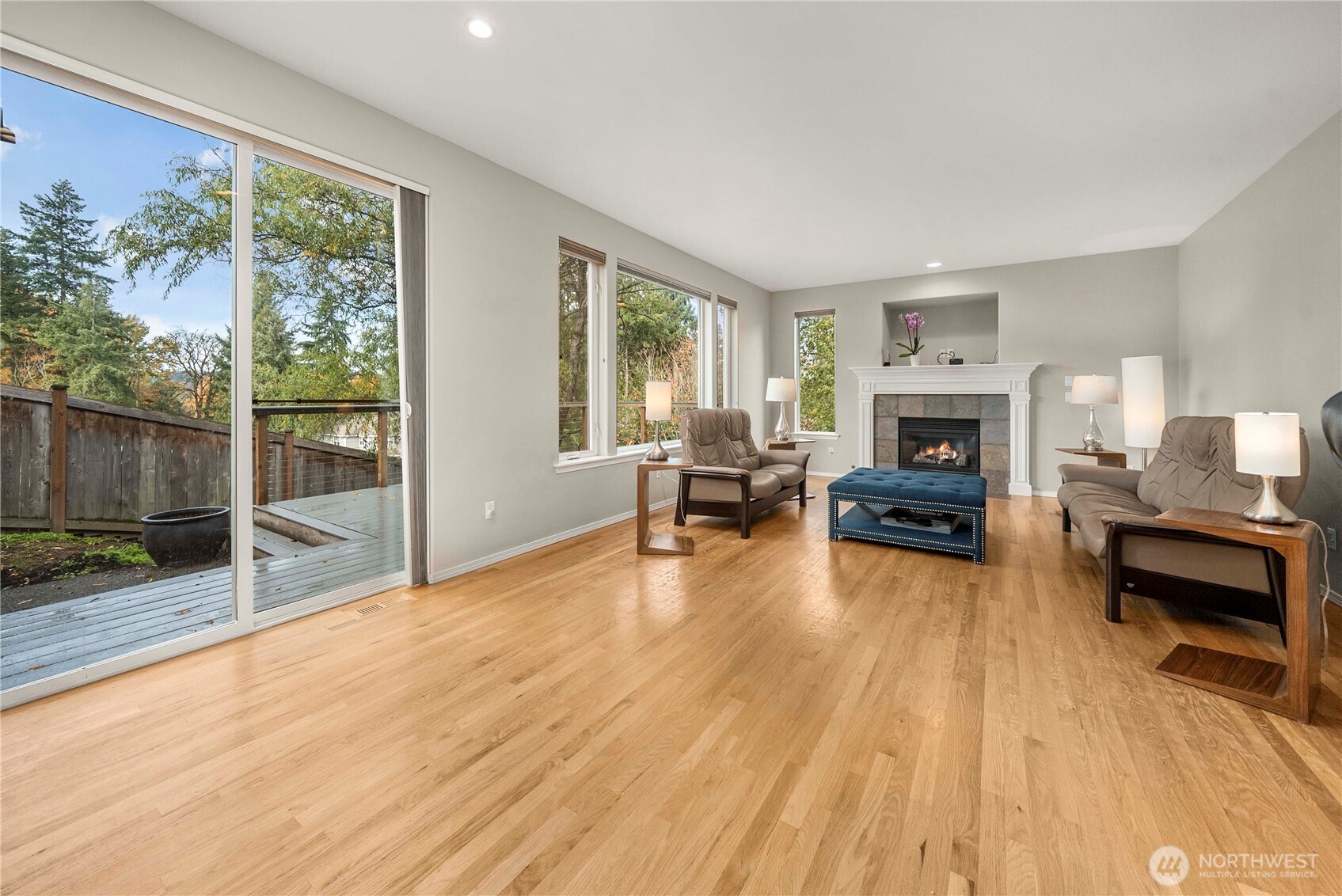 3723 Lincoln Court Northeast Renton, WA 98056 - Photo 28 of 37 a living room with furniture and a fireplace