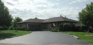 9629 Rambouillet Ridge Roscoe, IL 61073 - Photo 1 of 6 a house view with a garden space