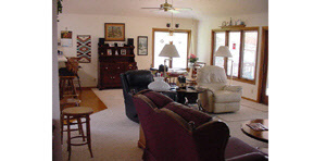 9629 Rambouillet Ridge Roscoe, IL 61073 - Photo 2 of 6 a living room with furniture and a window