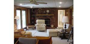 9629 Rambouillet Ridge Roscoe, IL 61073 - Photo 4 of 6 a living room with furniture and a fireplace