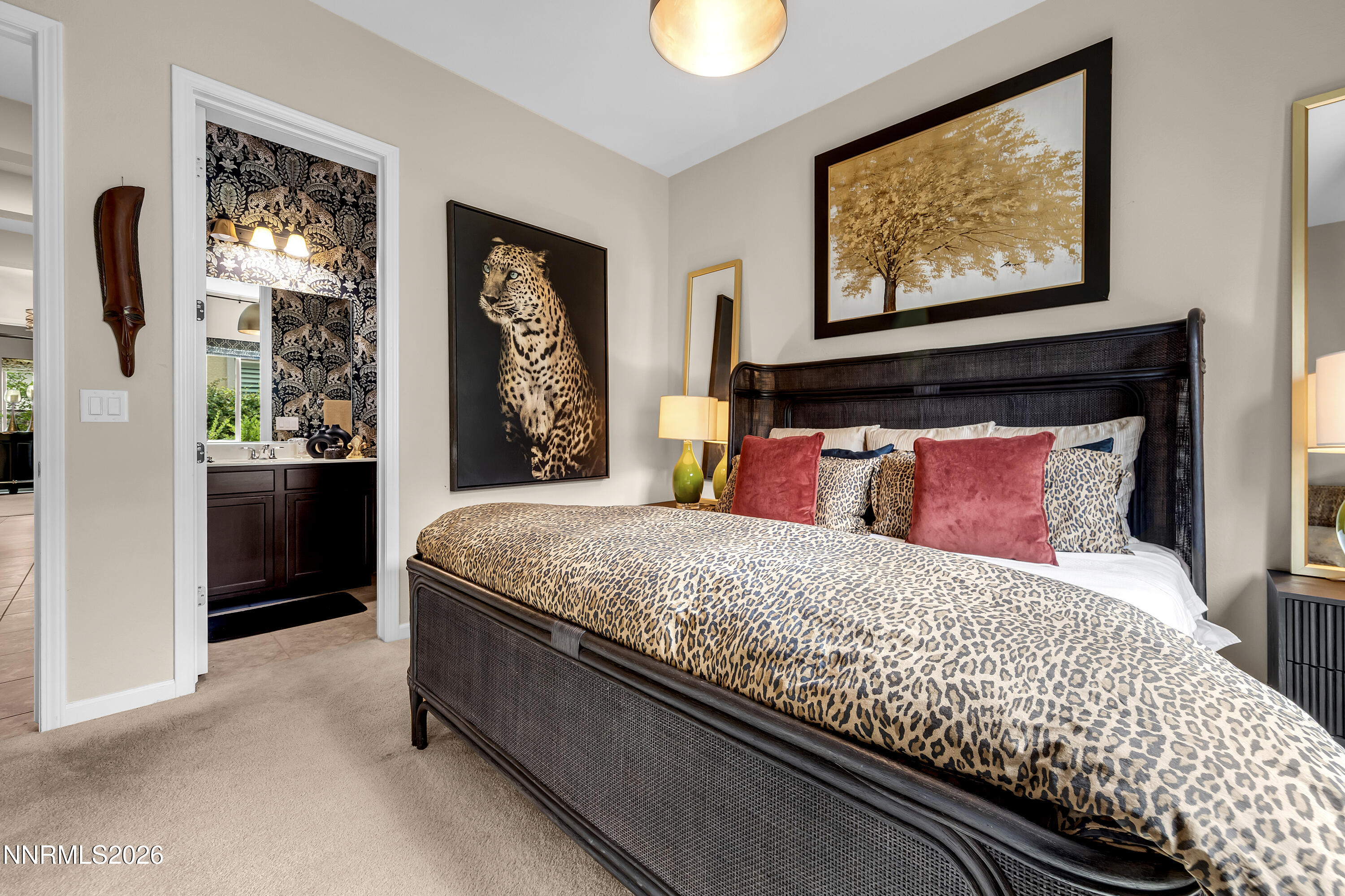 9021 Iron Sky Court Reno, NV 89523 - Photo 21 of 39 a bed sitting in a bedroom next to a window