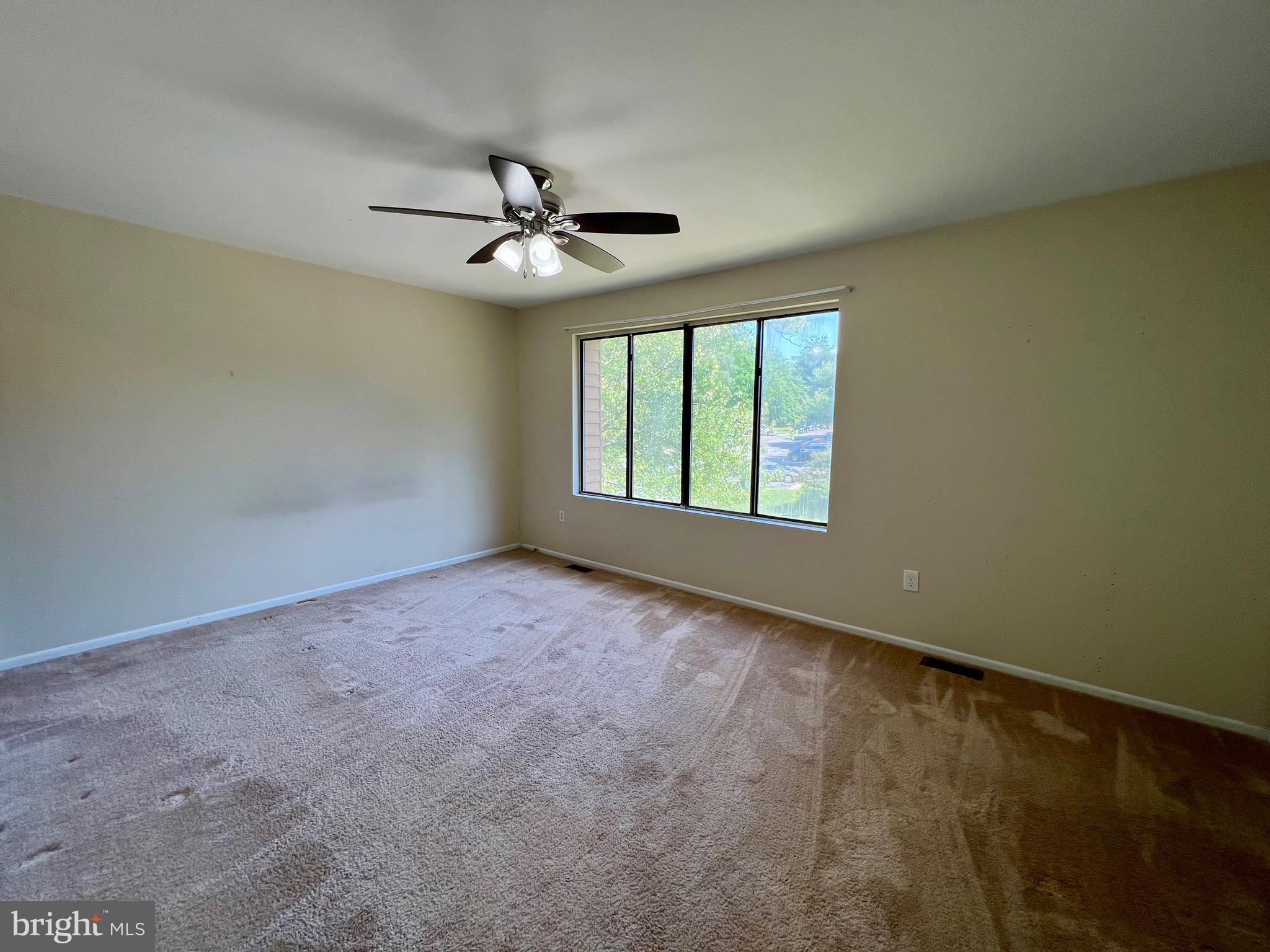 1010 Commanders Way North Annapolis, MD 21409 - Photo 22 of 33 an empty room with windows and fan