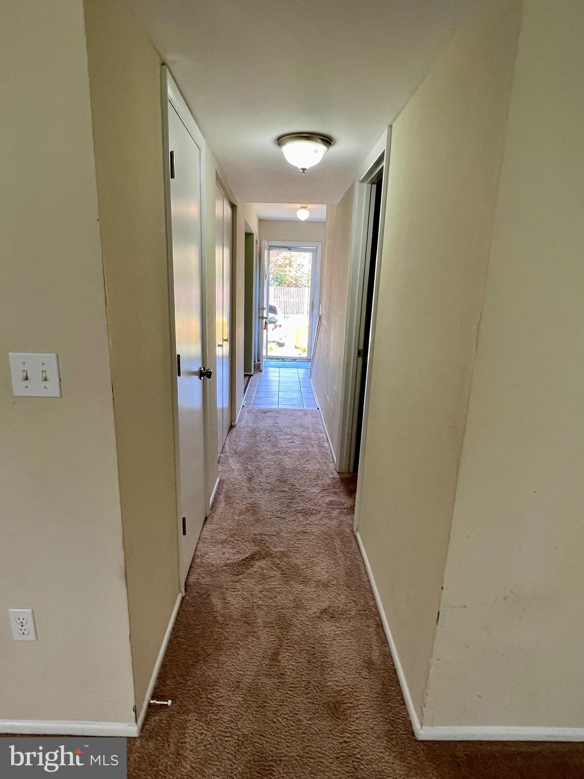 1010 Commanders Way North Annapolis, MD 21409 - Photo 10 of 33 a view of a hallway with wooden floor and staircase