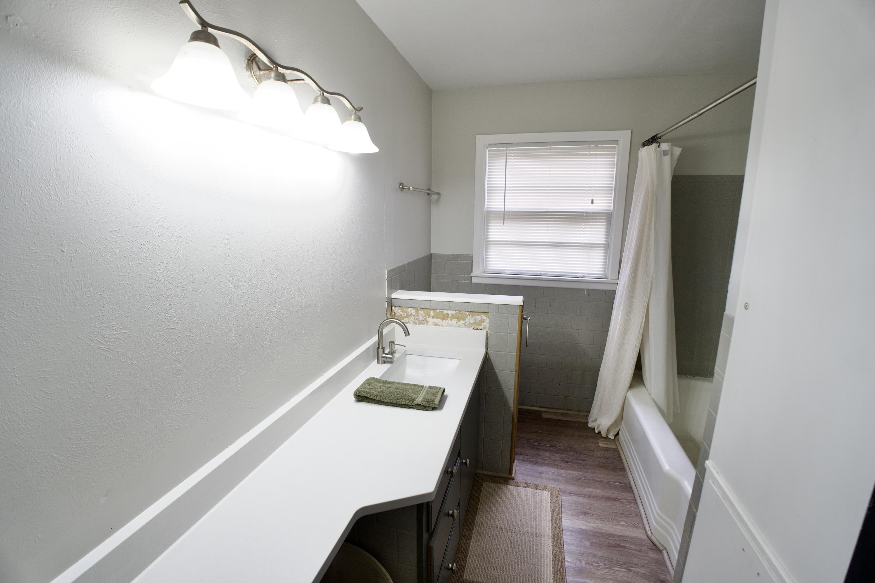 3412 42nd Street Lubbock, TX 79413 - Photo 12 of 17 a utility room with dryer and washer