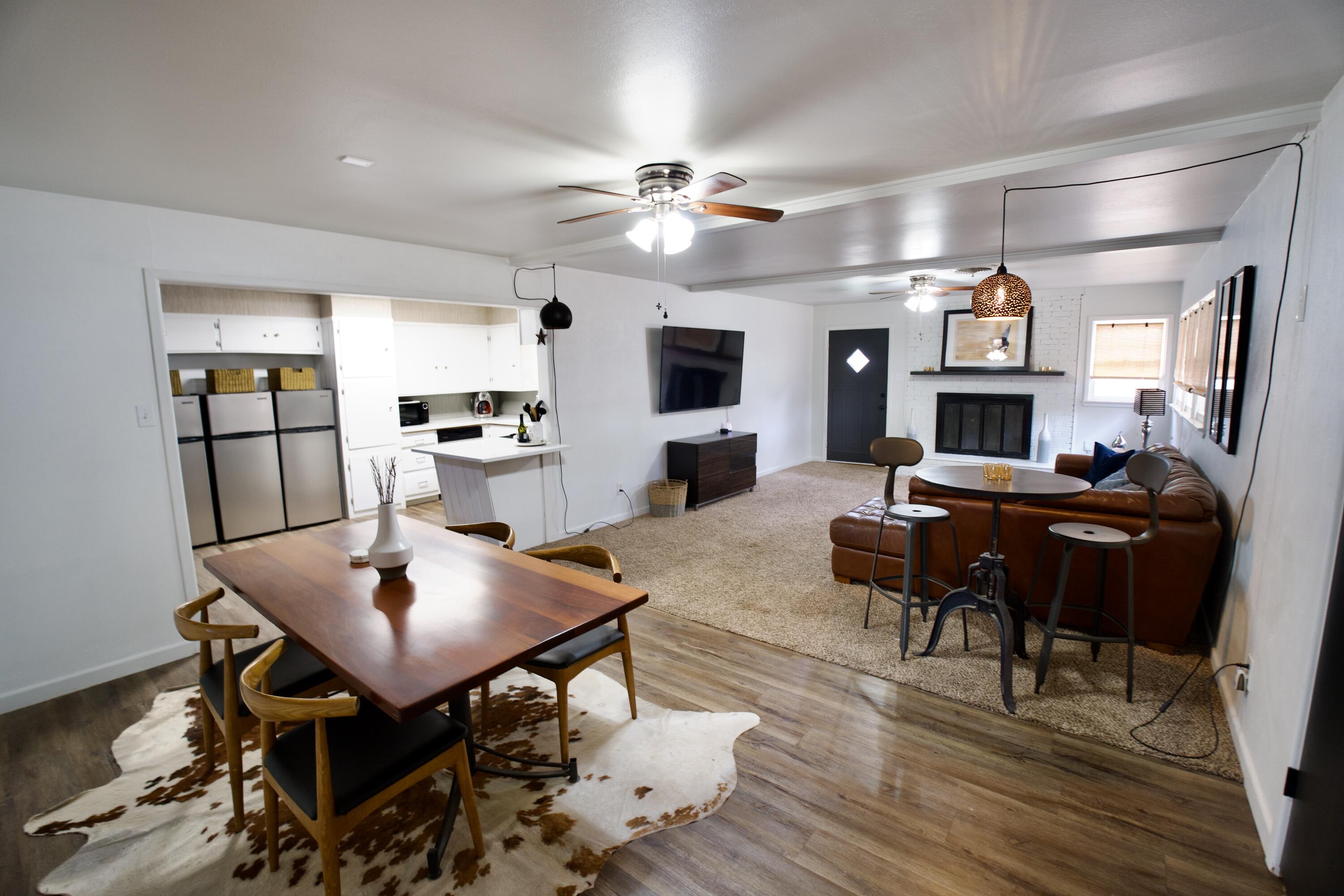 3412 42nd Street Lubbock, TX 79413 - Photo 6 of 17 a view of a dining room with furniture and a livingroom
