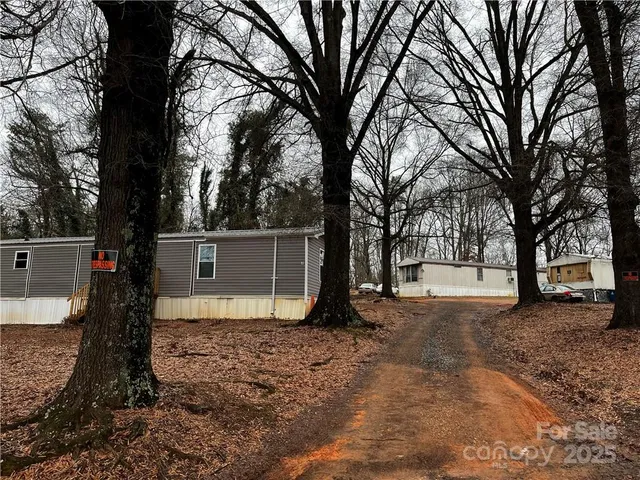 a house view with a backyard space
