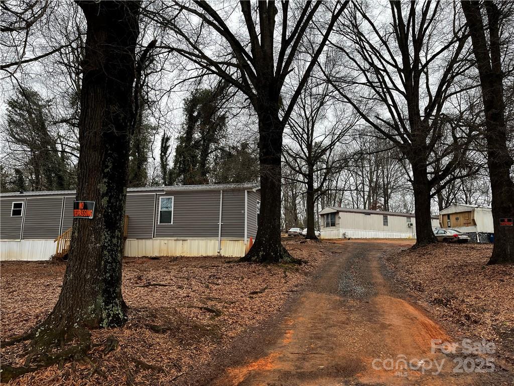 3680 Berry Road Connelly Springs, NC 28612 - Photo 3 of 3 a house view with a backyard space