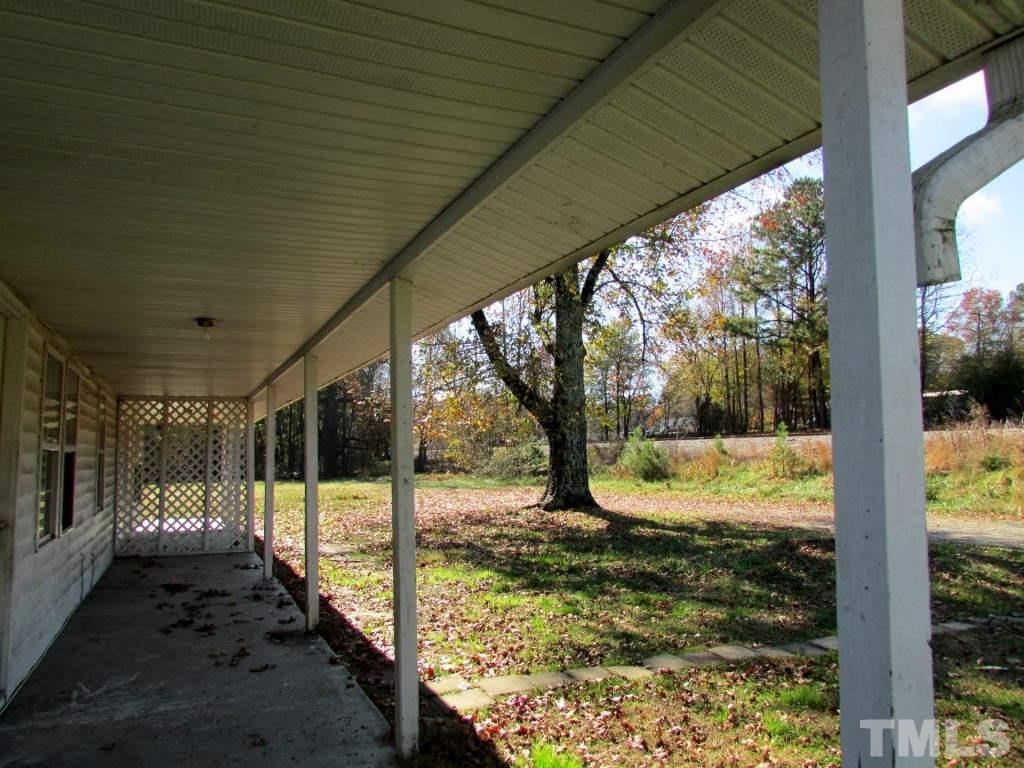 58 A & 58b Thaxton Road Roxboro, NC 27573 - Photo 2 of 16 a view of a porch