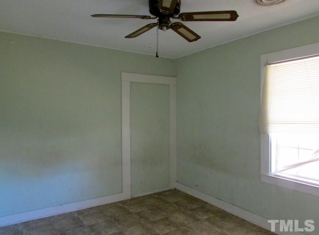 58 A & 58b Thaxton Road Roxboro, NC 27573 - Photo 5 of 16 an empty room with a window
