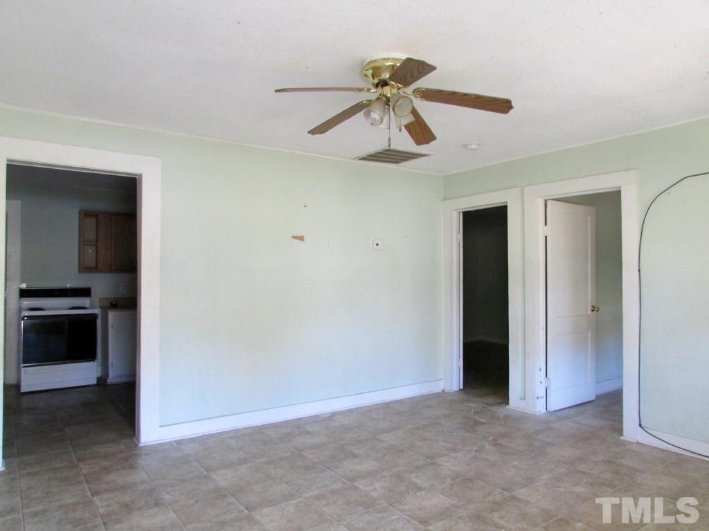 58 A & 58b Thaxton Road Roxboro, NC 27573 - Photo 7 of 16 a view of a livingroom with a ceiling fan