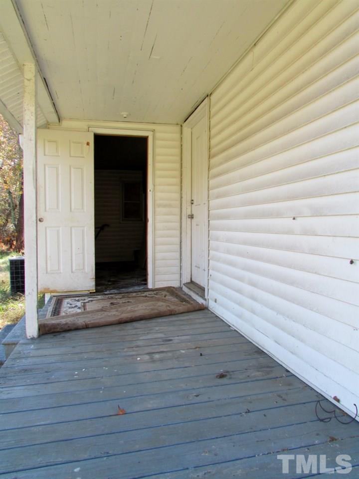 58 A & 58b Thaxton Road Roxboro, NC 27573 - Photo 9 of 16 a view of front door of house