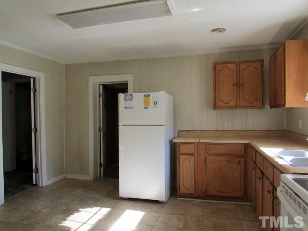 58 A & 58b Thaxton Road Roxboro, NC 27573 - Photo 10 of 16 a utility room with dryer and washer