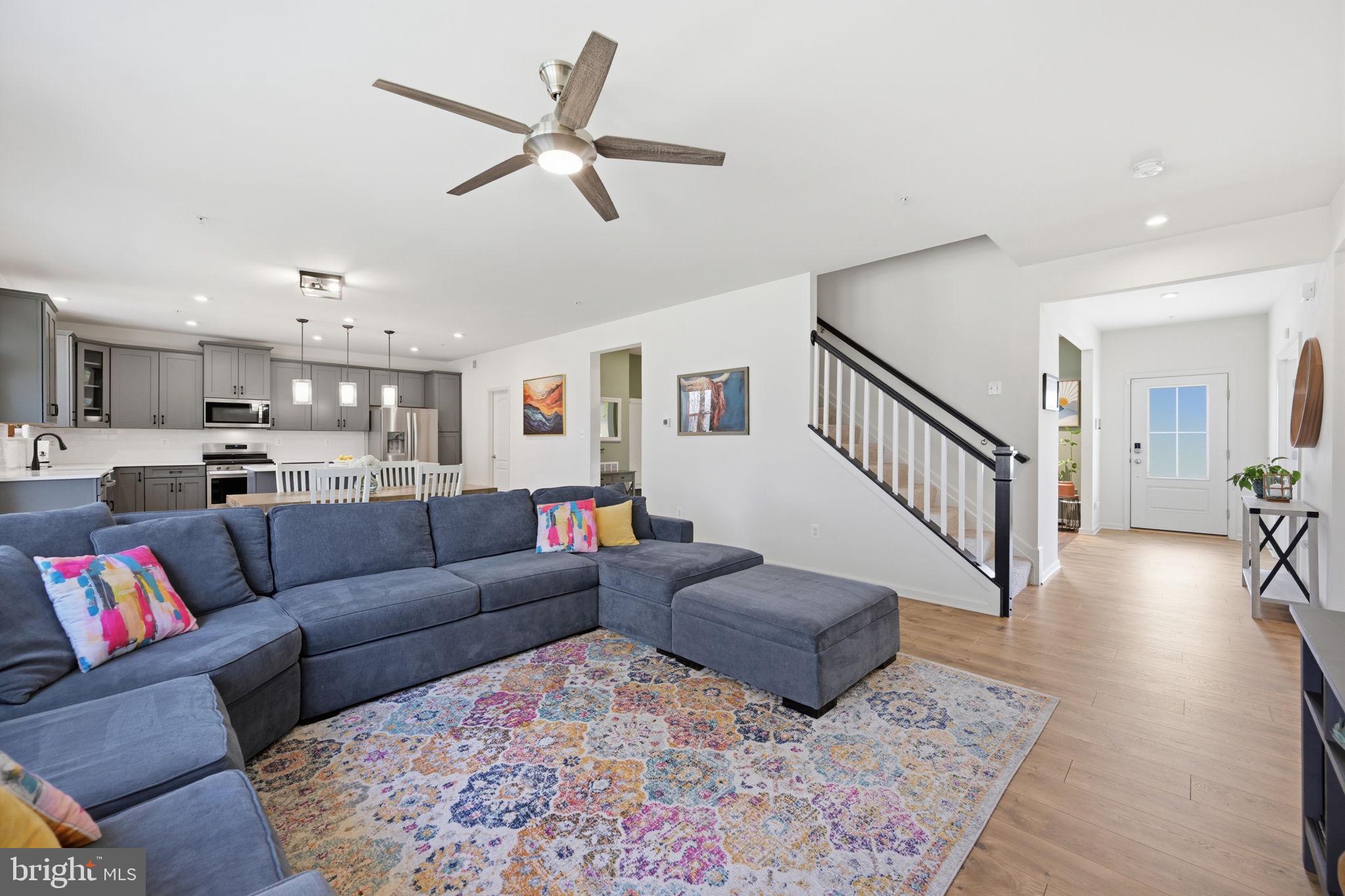 2397 Terrapin Crossing Jessup, MD 20794 - Photo 11 of 40 a living room with furniture and a view of kitchen