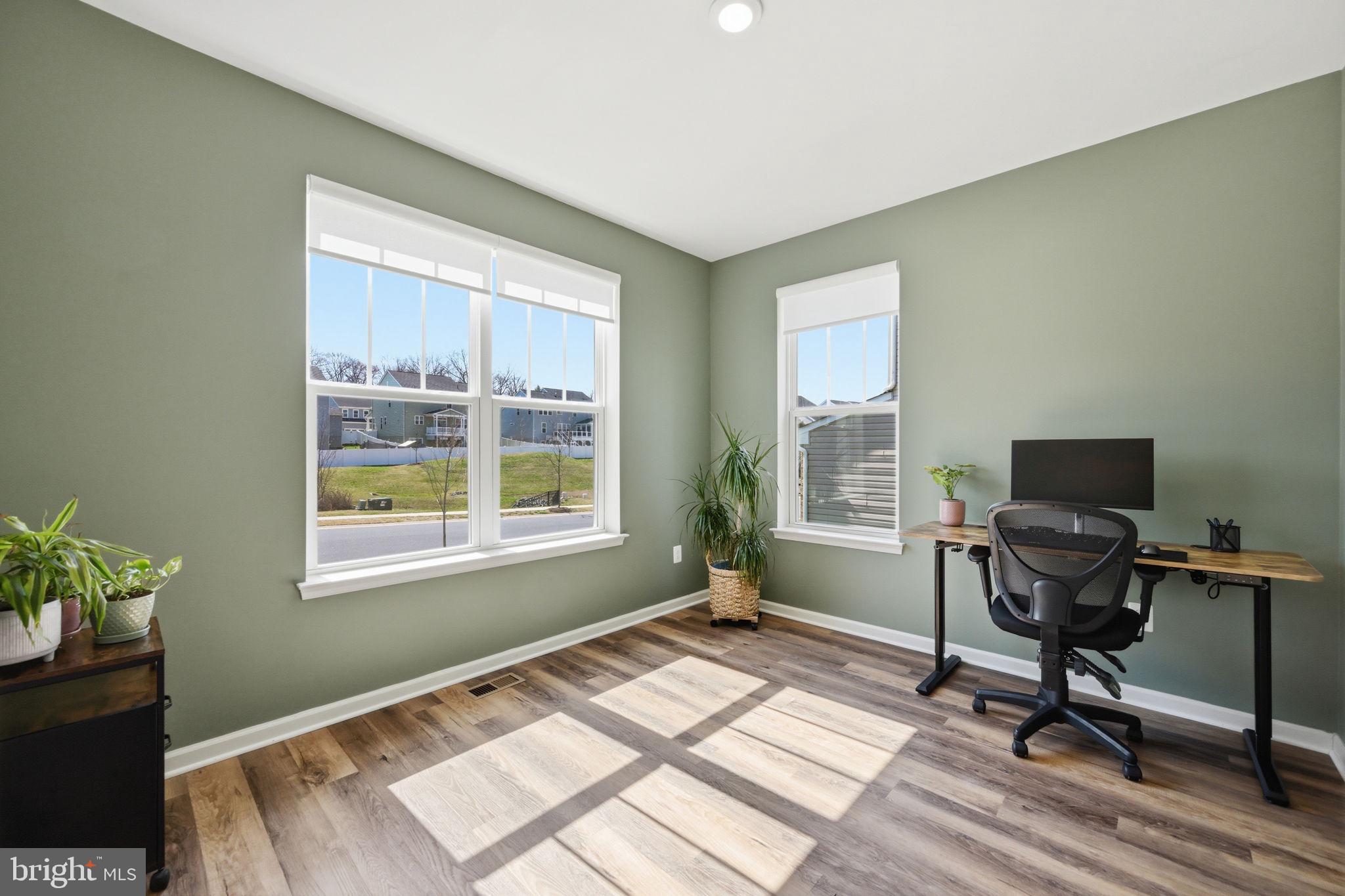 2397 Terrapin Crossing Jessup, MD 20794 - Photo 15 of 40 a view of a workspace with furniture and a window