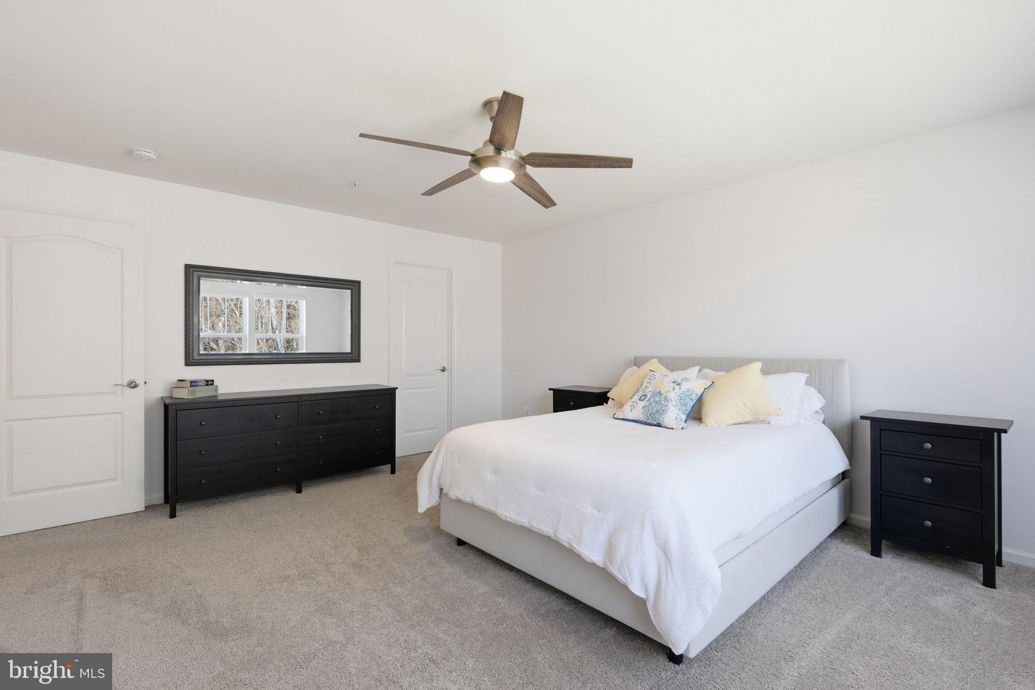 2397 Terrapin Crossing Jessup, MD 20794 - Photo 23 of 40 a bedroom with a bed and cabinet