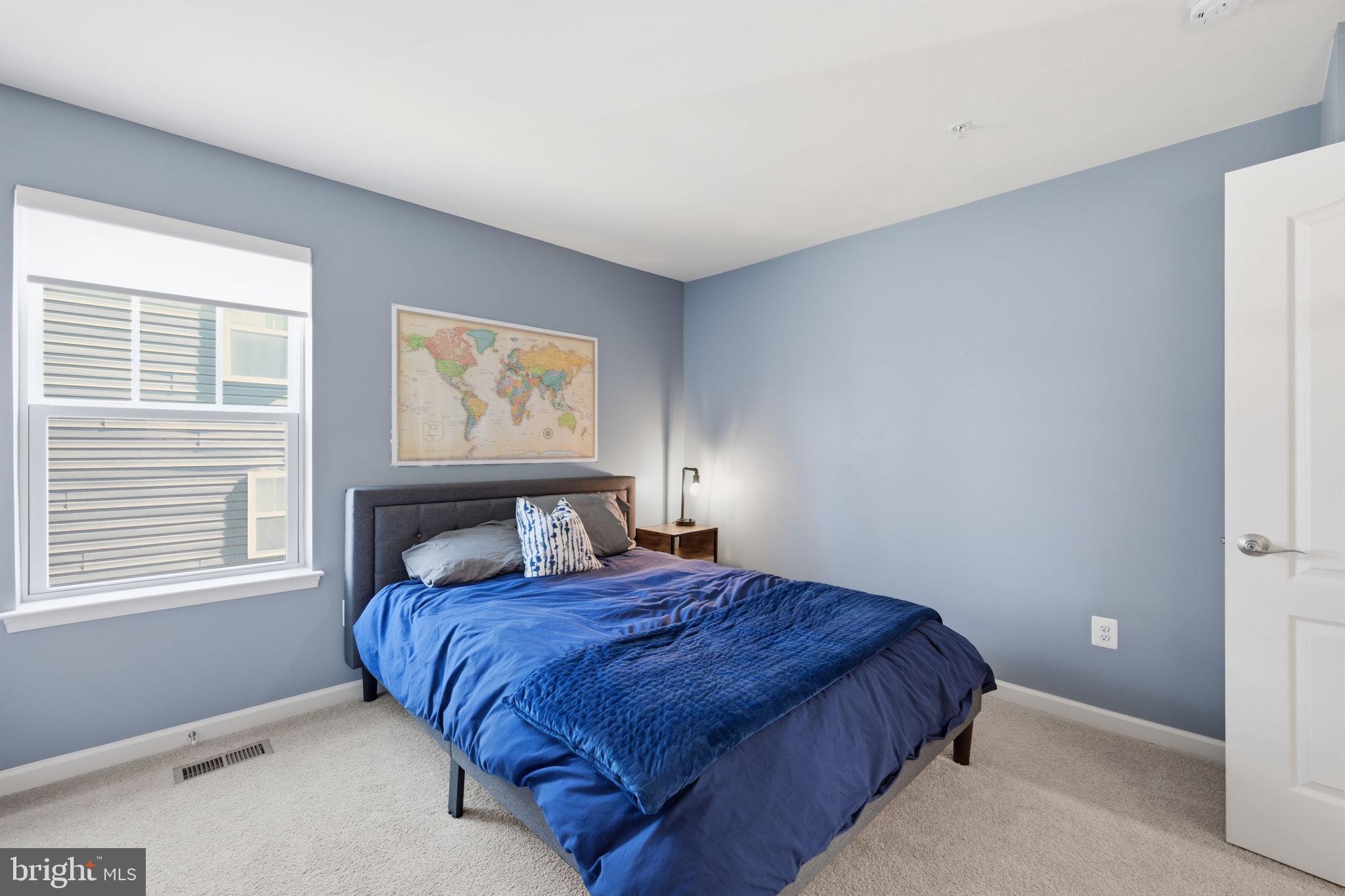 2397 Terrapin Crossing Jessup, MD 20794 - Photo 29 of 40 a bedroom with a large bed and a window