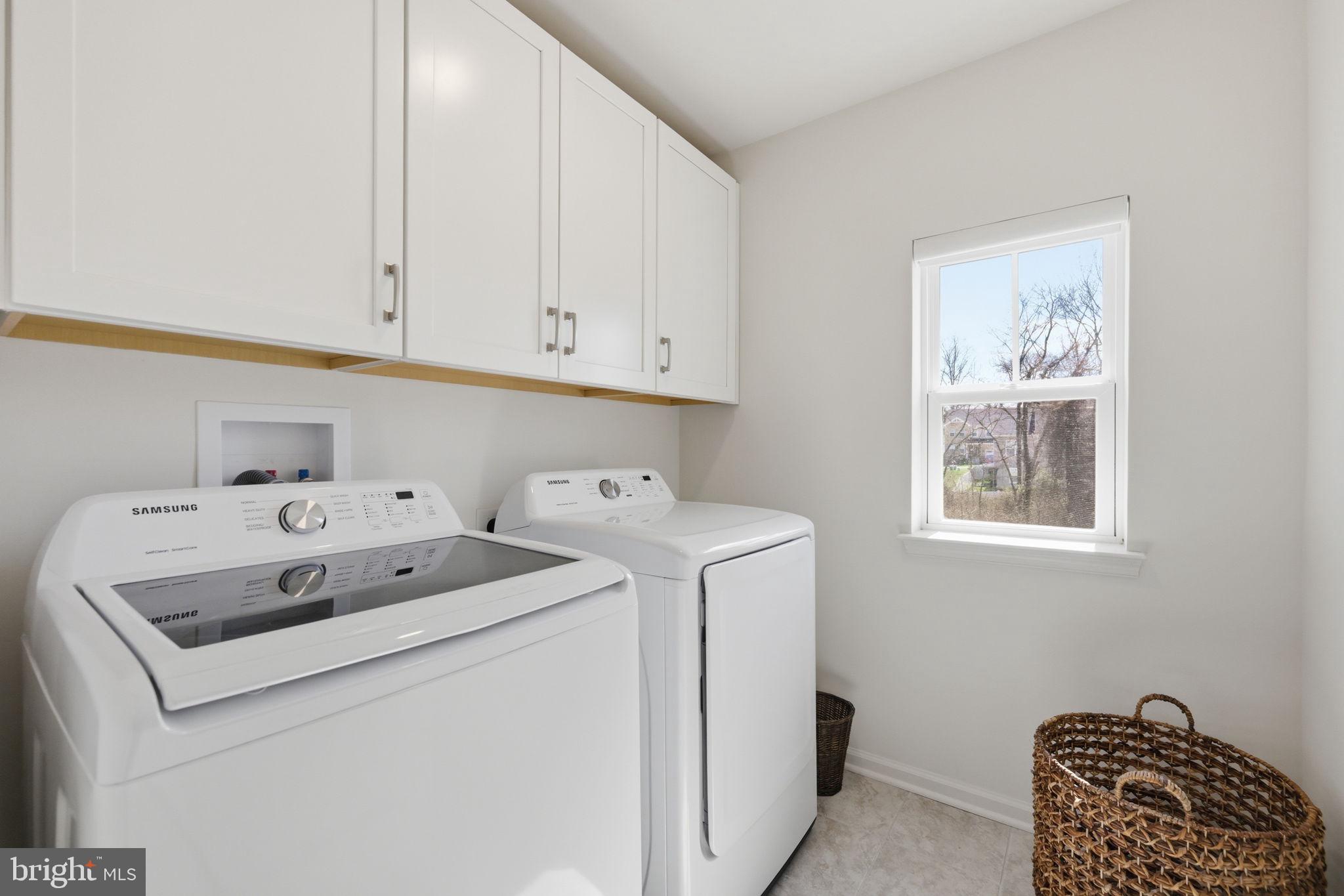 2397 Terrapin Crossing Jessup, MD 20794 - Photo 32 of 40 a utility room with dryer and washer