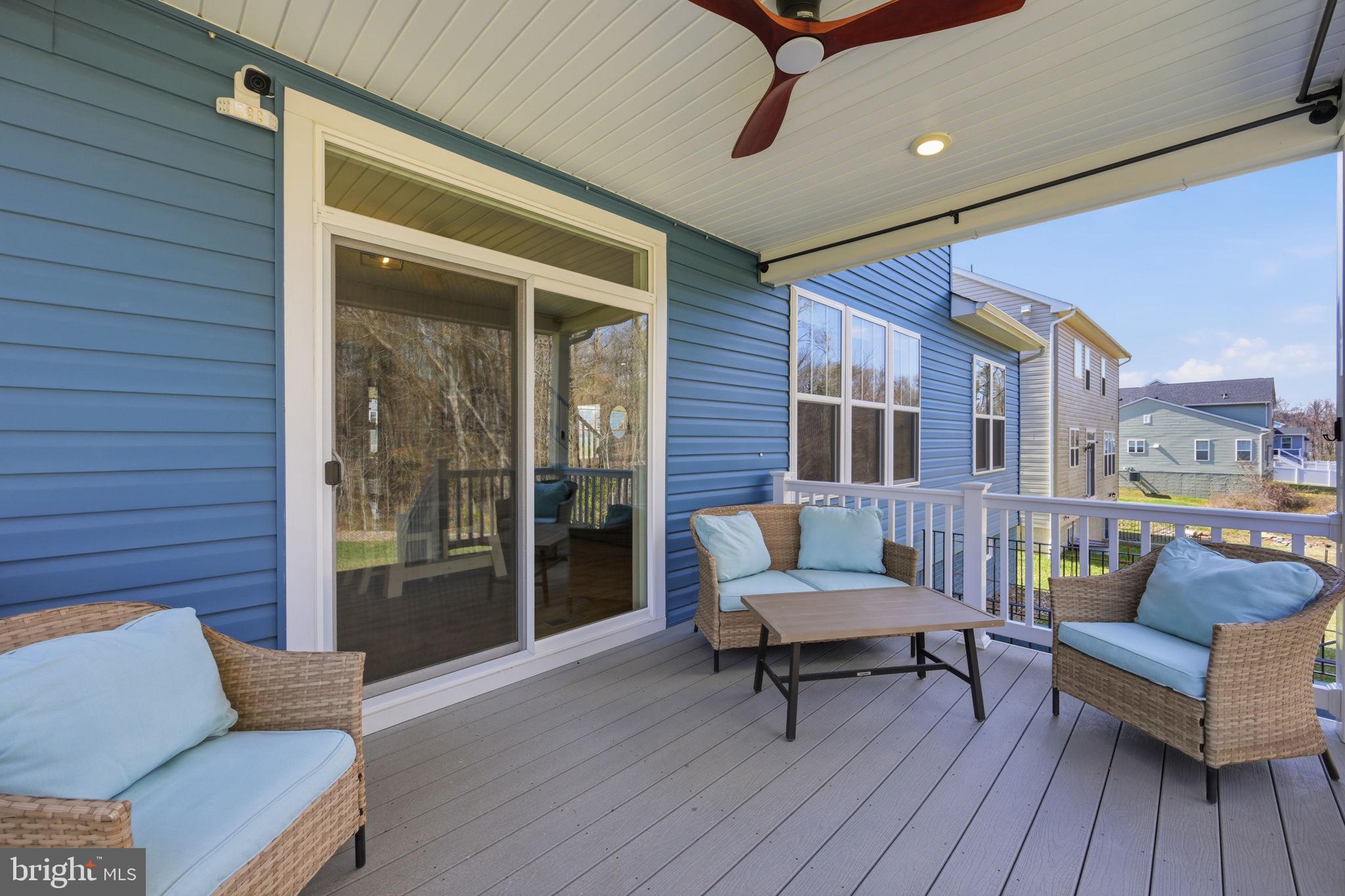 2397 Terrapin Crossing Jessup, MD 20794 - Photo 33 of 40 a outdoor living space with furniture and a window