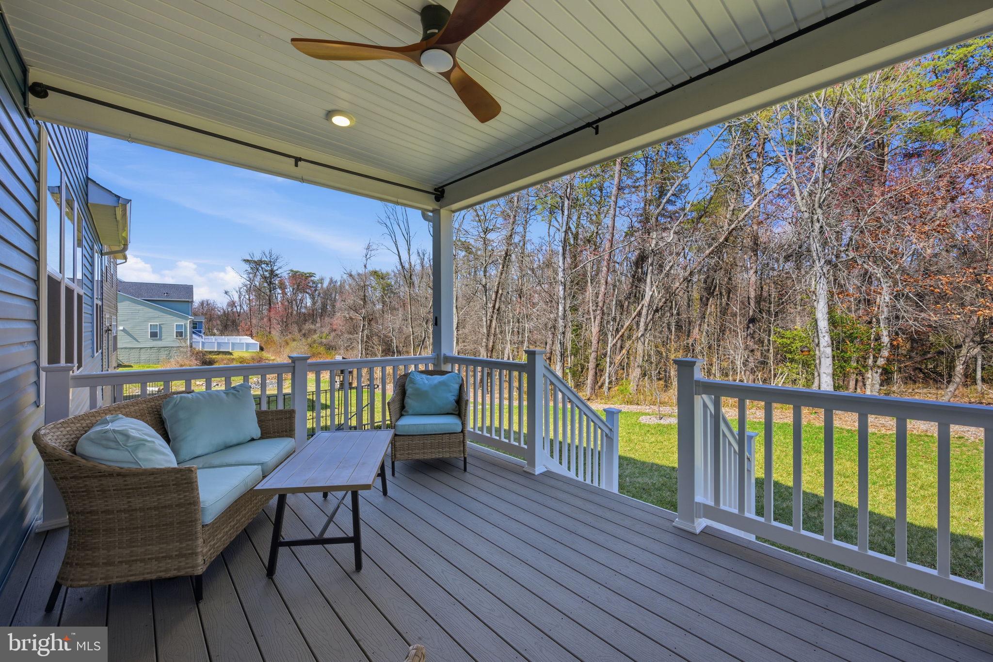 2397 Terrapin Crossing Jessup, MD 20794 - Photo 34 of 40 a balcony with furniture and wooden floor
