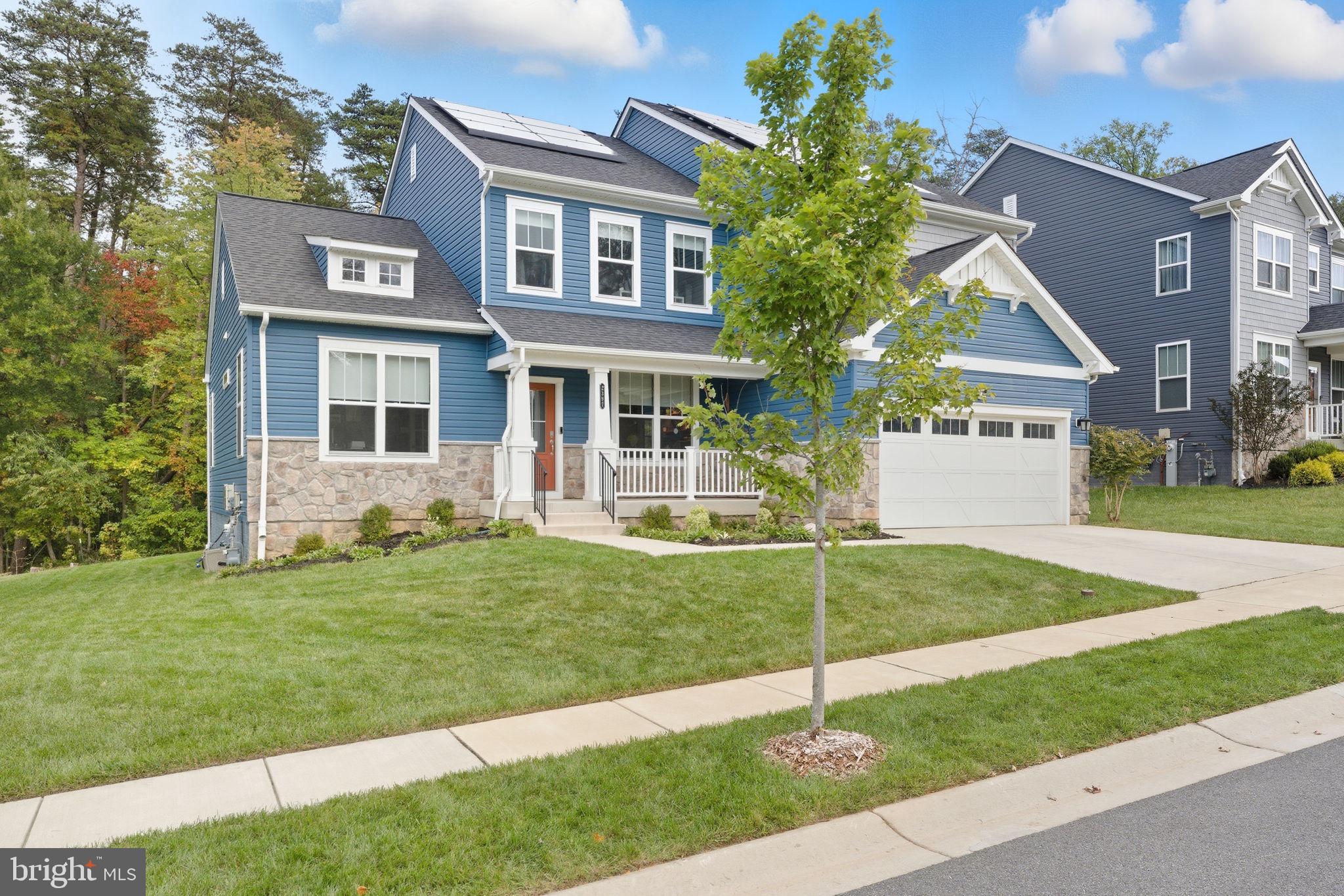2397 Terrapin Crossing Jessup, MD 20794 - Photo 35 of 40 a house that has a tree in front of the house