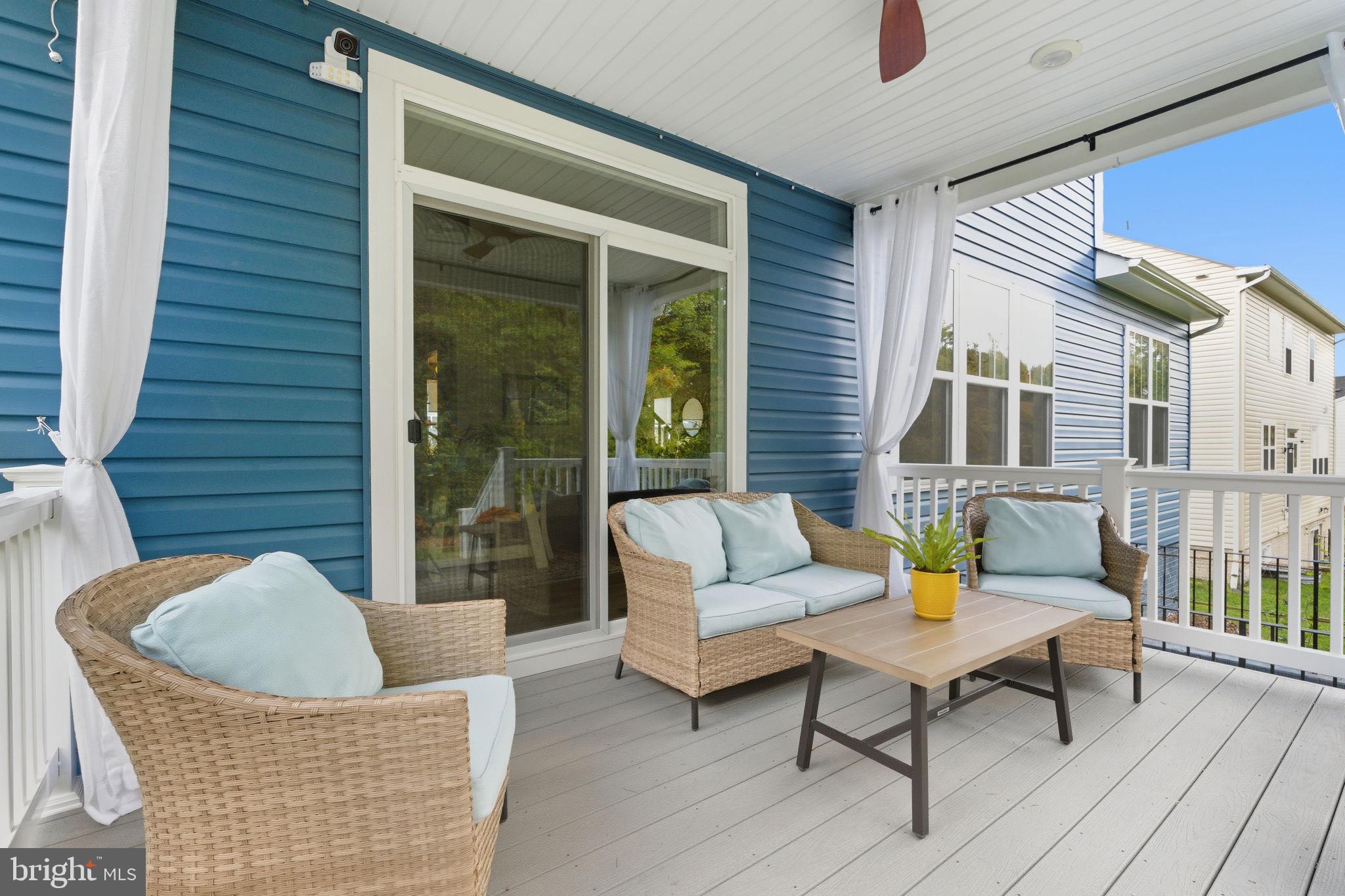 2397 Terrapin Crossing Jessup, MD 20794 - Photo 4 of 40 a outdoor living space with patio furniture and potted plants