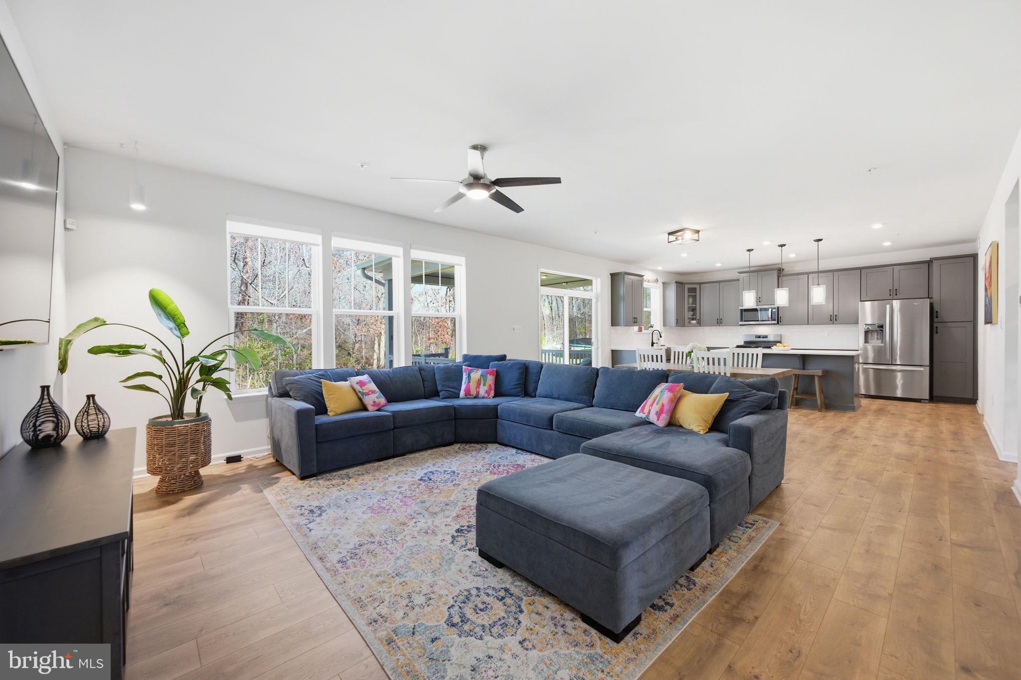 2397 Terrapin Crossing Jessup, MD 20794 - Photo 6 of 40 a living room with furniture and kitchen view
