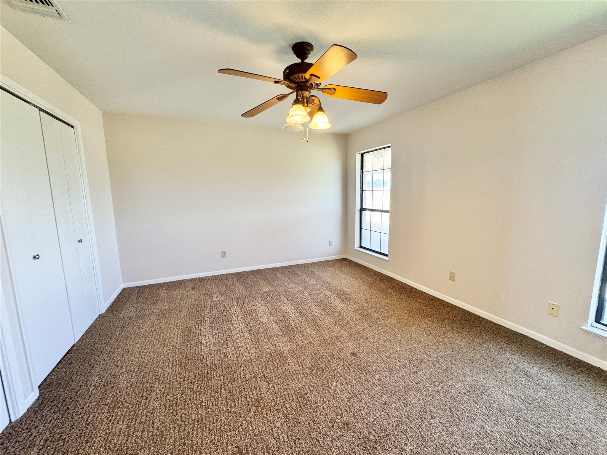 18512 Carlson Lane Elgin, TX 78621 - Photo 11 of 29 primary bedroom
